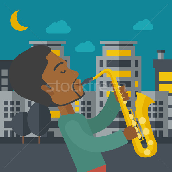 Musicien jouer saxophone rues nuit vecteur [[stock_photo]] © RAStudio