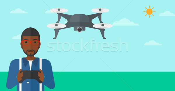 Man flying drone. Stock photo © RAStudio