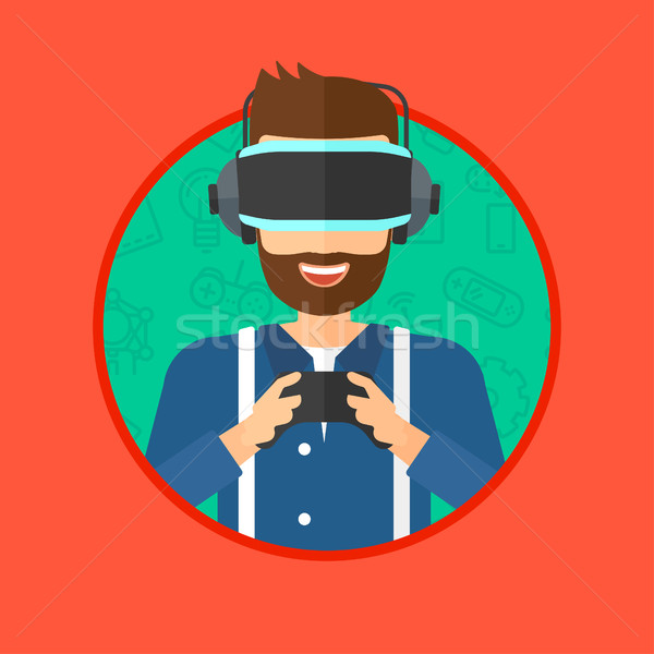 Stock photo: Man wearing virtual reality headset.