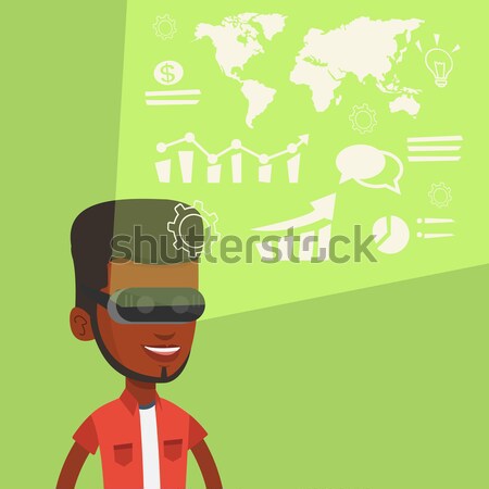 Businessman in vr headset analyzing virtual data. Stock photo © RAStudio