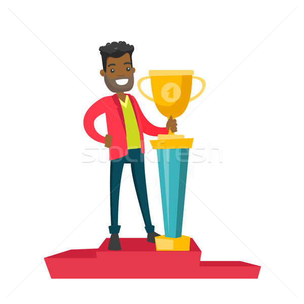 Man standing on the pedestal with business award. Stock photo © RAStudio