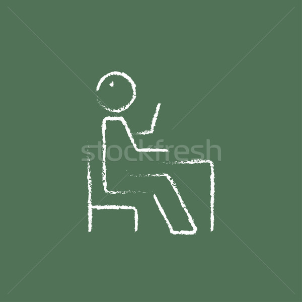 Sitting student with raised arm icon drawn in chalk. Stock photo © RAStudio