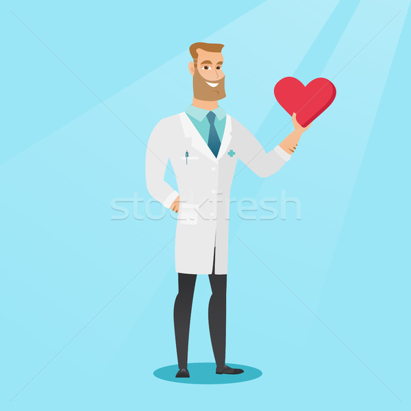 Orvos kardiológus tart szív kaukázusi orvosi Stock fotó © RAStudio