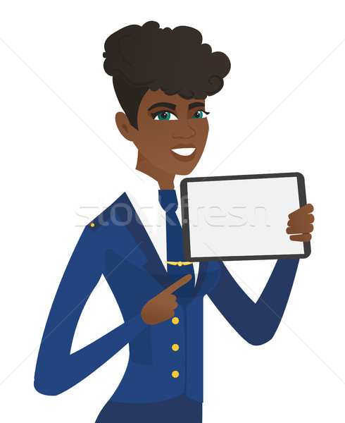Young african stewardess holding tablet computer. Stock photo © RAStudio