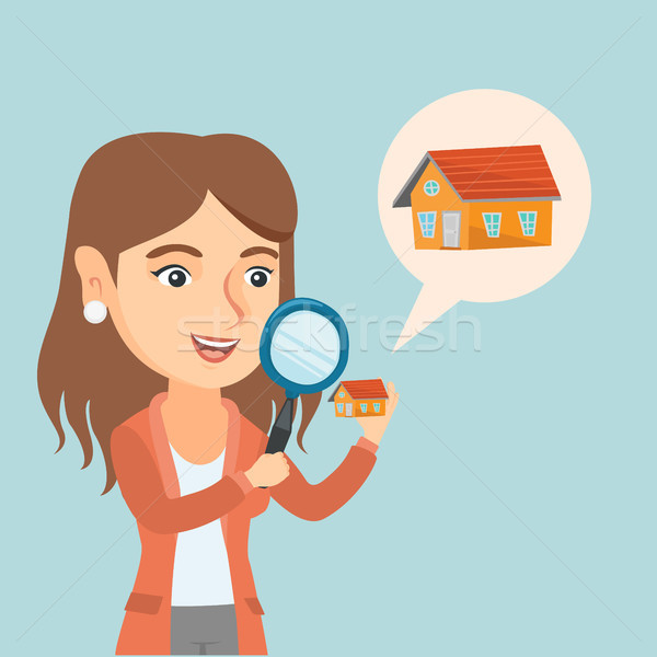Young caucasian woman looking for a house. Stock photo © RAStudio