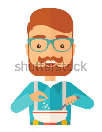 Young caucasian is eating salad for lunch in the restaurant. Stock photo © RAStudio