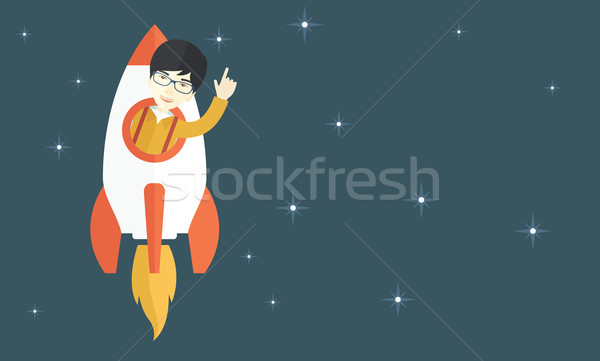 Asian young guy inside the rocket. Stock photo © RAStudio