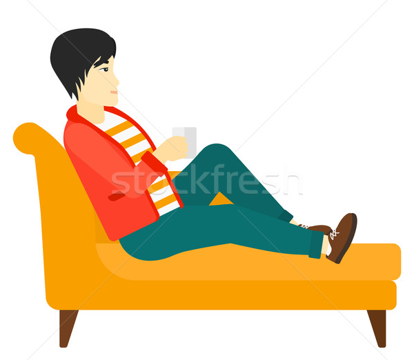 Man lying with cup of tea. Stock photo © RAStudio