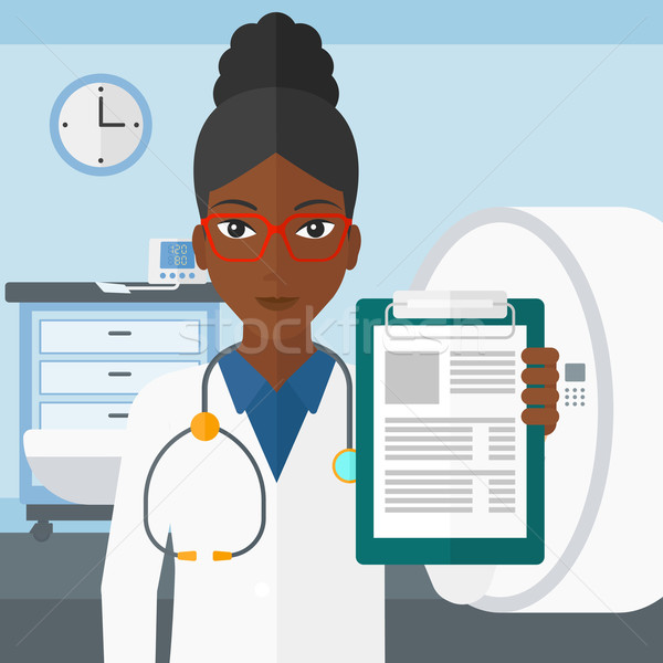 Doctor in hospital room with MRI machine. Stock photo © RAStudio