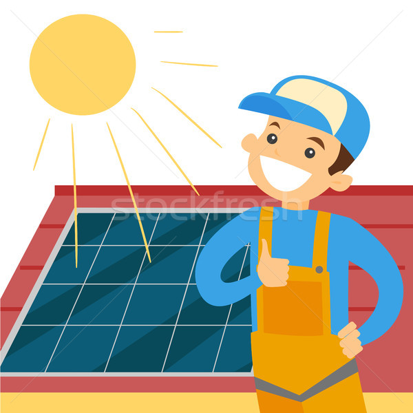 Caucasian white constructor installing solar panel Stock photo © RAStudio