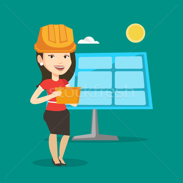 Female worker of solar power plant. Stock photo © RAStudio