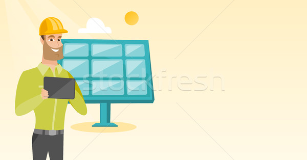 Caucasian worker of solar power plant. Stock photo © RAStudio