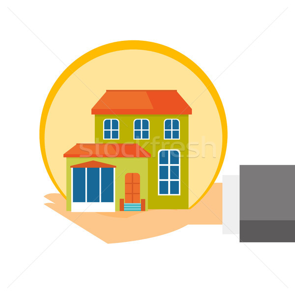 Insurance agent hands with the model of house. Stock photo © RAStudio