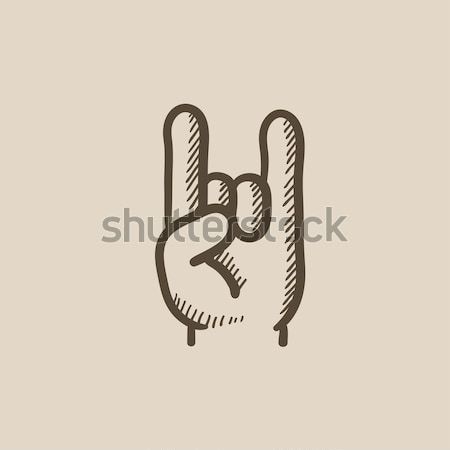 Rock rouler signe de la main croquis icône web Photo stock © RAStudio