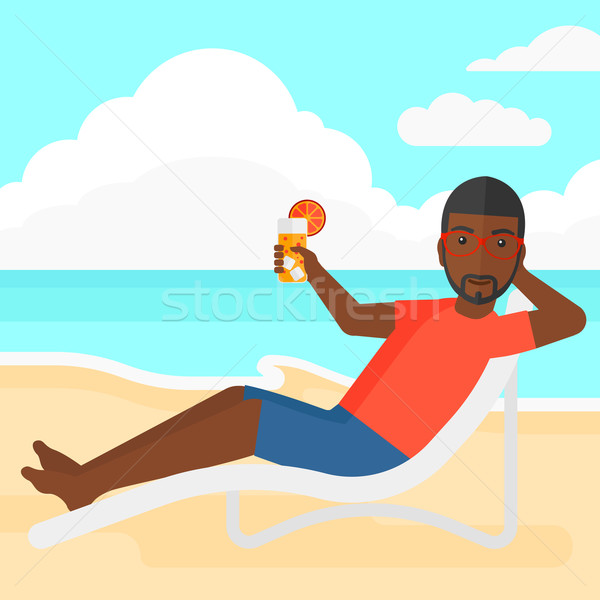 Man sitting in chaise longue. Stock photo © RAStudio