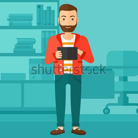 Man using tablet computer. Stock photo © RAStudio