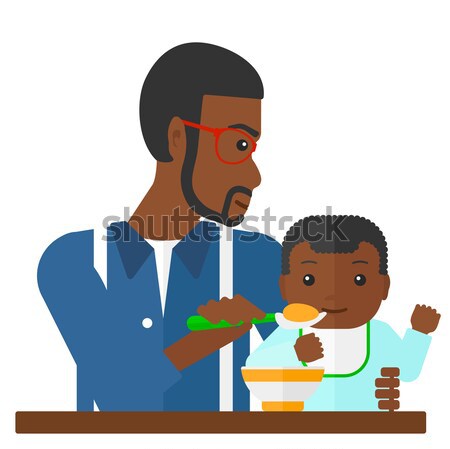 Man feeding baby. Stock photo © RAStudio