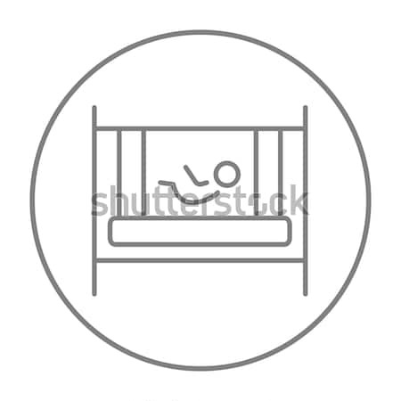 Baby laying in crib line icon. Stock photo © RAStudio