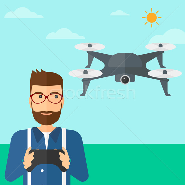 Man flying drone. Stock photo © RAStudio