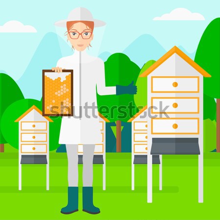 Bee-keeper at apiary. Stock photo © RAStudio