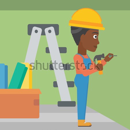 Constructor hammering nail. Stock photo © RAStudio