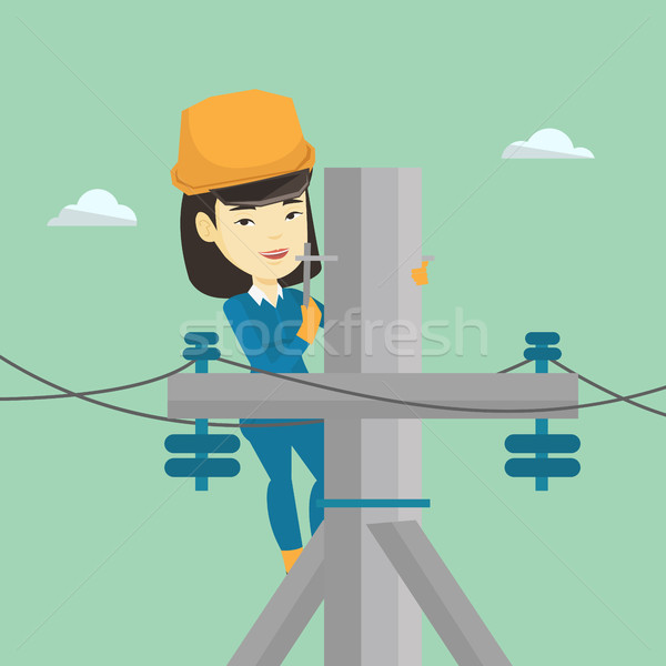 Electrician working on electric power pole. Stock photo © RAStudio