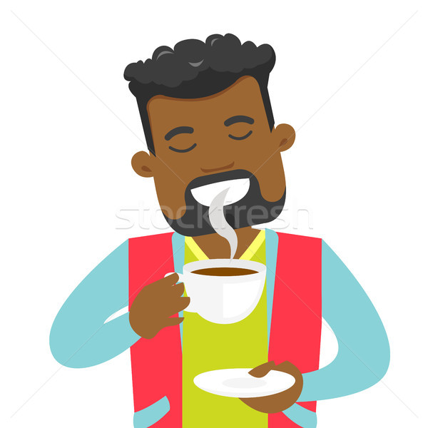 Young african-american man enjoying cup of coffee. Stock photo © RAStudio