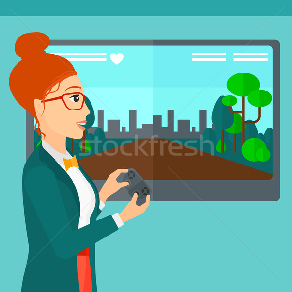 Woman playing video game. Stock photo © RAStudio