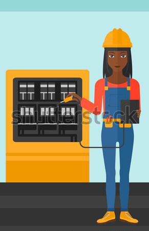 Electrician with electrical equipment. Stock photo © RAStudio