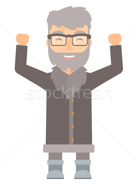 North man standing with raised arms up. Stock photo © RAStudio