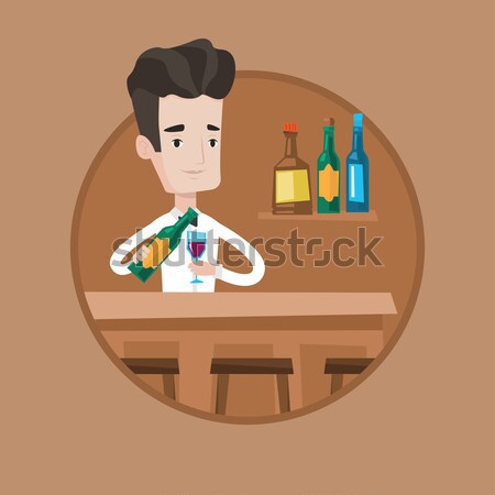 Bartender standing at the bar counter. Stock photo © RAStudio