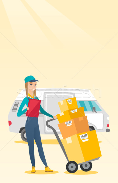 Delivery courier with cardboard boxes. Stock photo © RAStudio