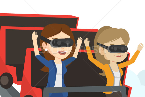 Stock photo: Friends in vr headset riding on roller coaster.