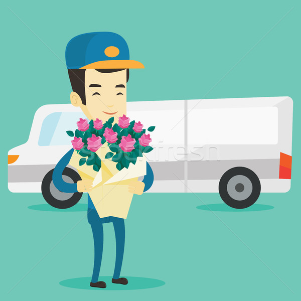 Delivery courier holding bouquet of flowers. Stock photo © RAStudio