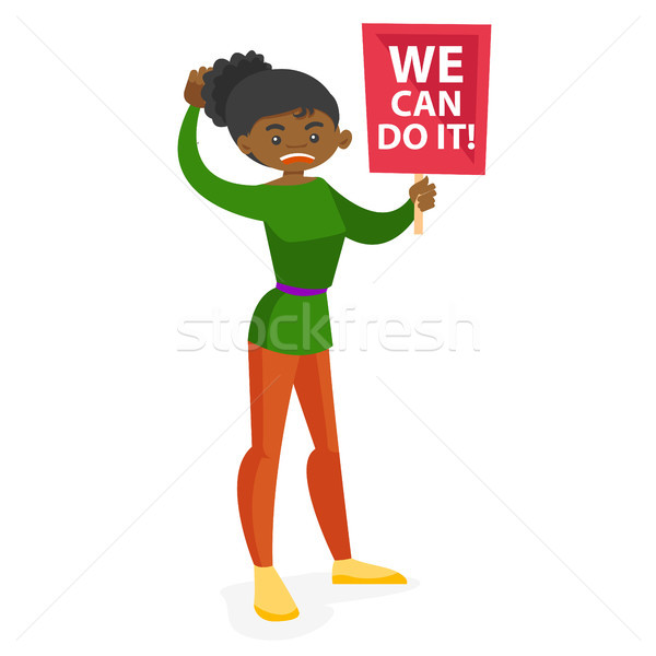 Young feminist holding placard at protest action. Stock photo © RAStudio