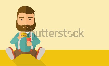 Fat man sitting while eating.   Stock photo © RAStudio