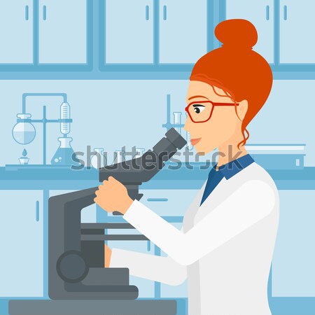 Laboratory assistant with microscope. Stock photo © RAStudio