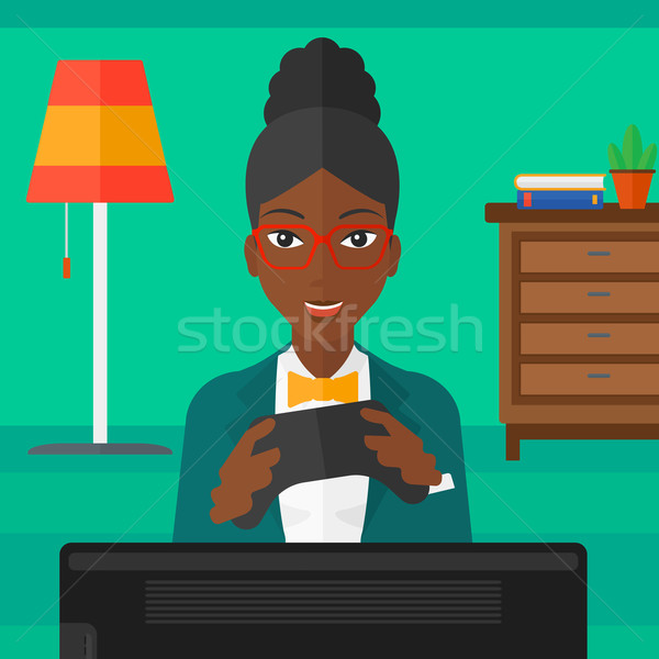 Woman playing video game. Stock photo © RAStudio