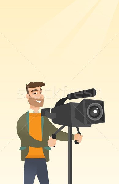 Cameraman with a movie camera on tripod. Stock photo © RAStudio