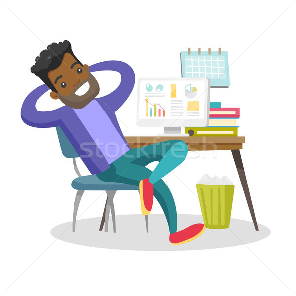 Young african-american employee relaxing in office Stock photo © RAStudio
