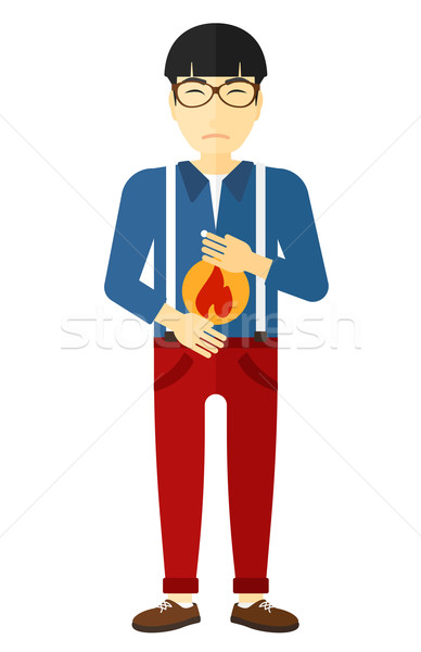 Man suffering from heartburn. Stock photo © RAStudio