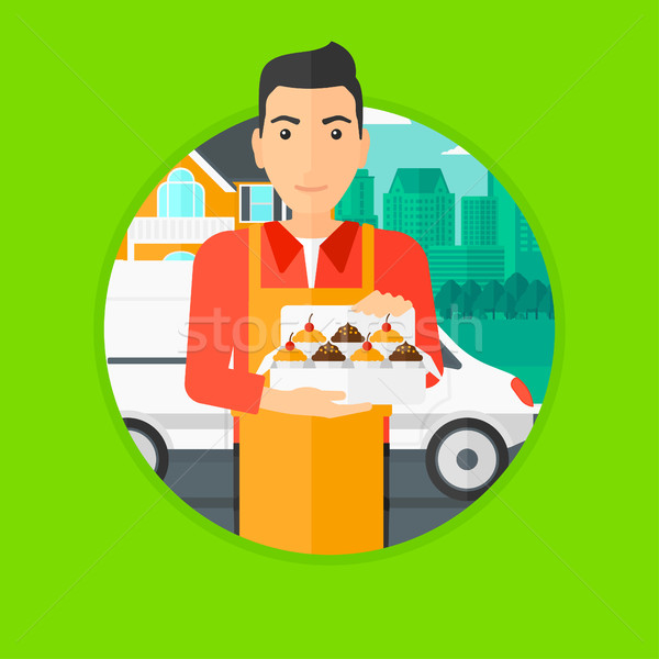 Baker delivering cakes. Stock photo © RAStudio