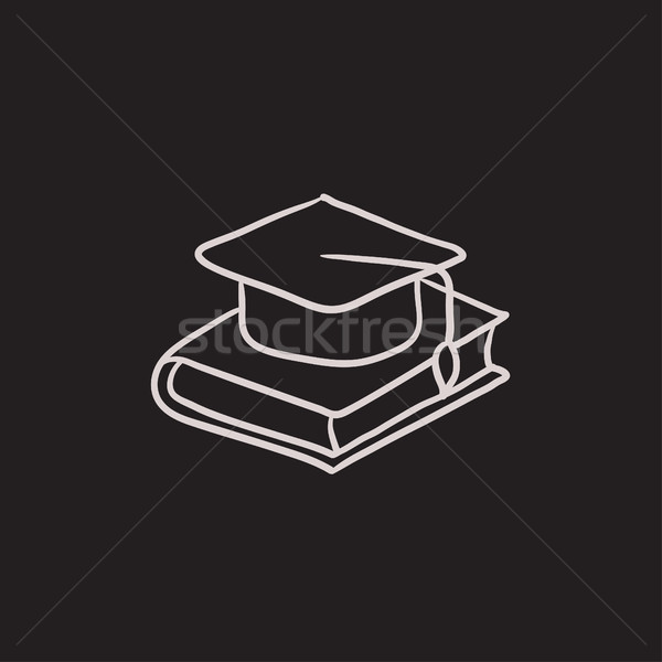 Graduation cap laying on book sketch icon. Stock photo © RAStudio