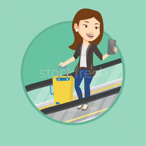 女性 スマートフォン エスカレーター 空港 ビジネス女性 立って ストックフォト © RAStudio