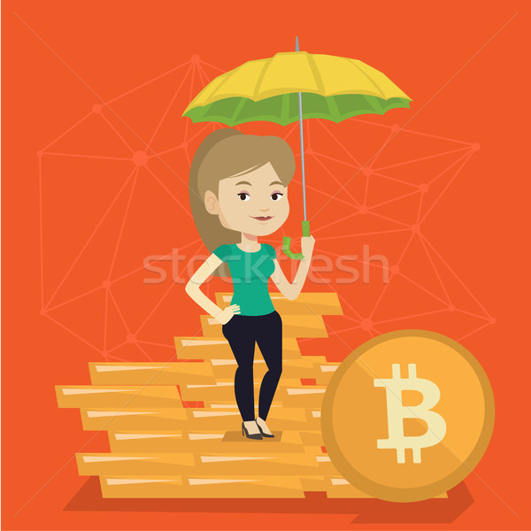Young woman with umbrella protecting bitcoin coins Stock photo © RAStudio