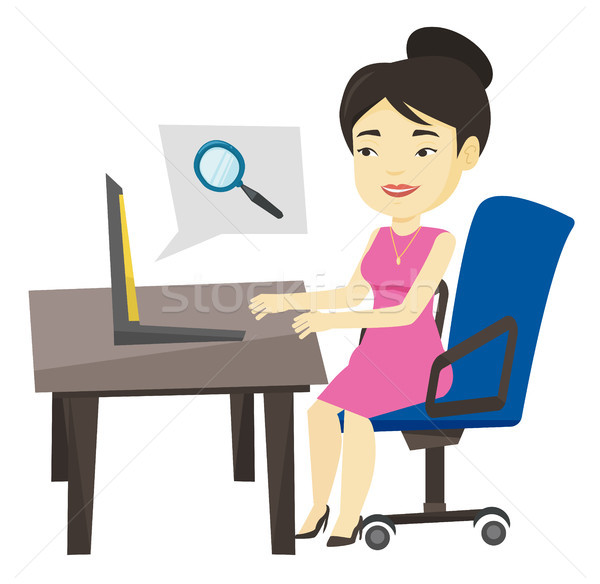 Business woman searching information on internet. Stock photo © RAStudio