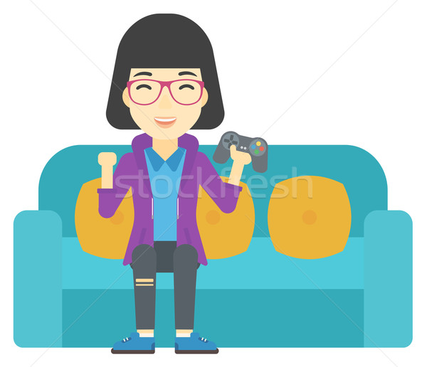 Woman playing video game. Stock photo © RAStudio