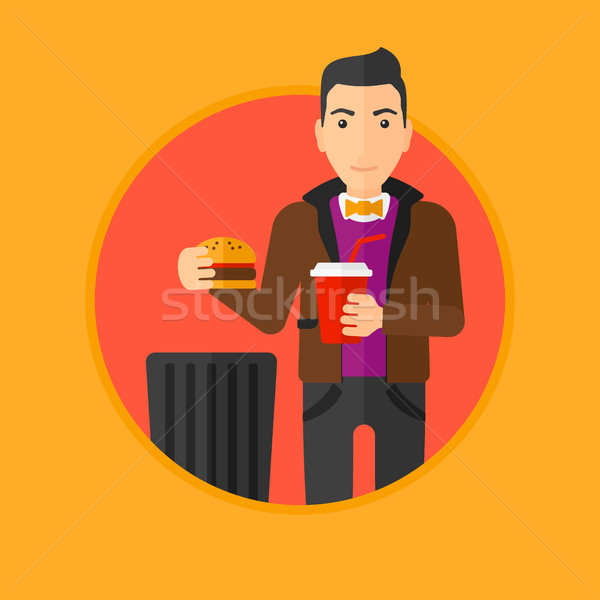 Man throwing junk food. Stock photo © RAStudio