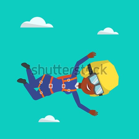 African parachutist jumping with parachute. Stock photo © RAStudio