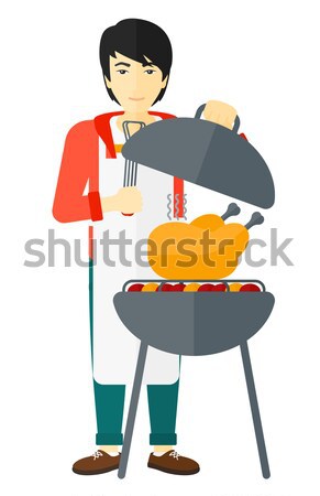 Homme cuisson poulet barbecue asian extérieur Photo stock © RAStudio